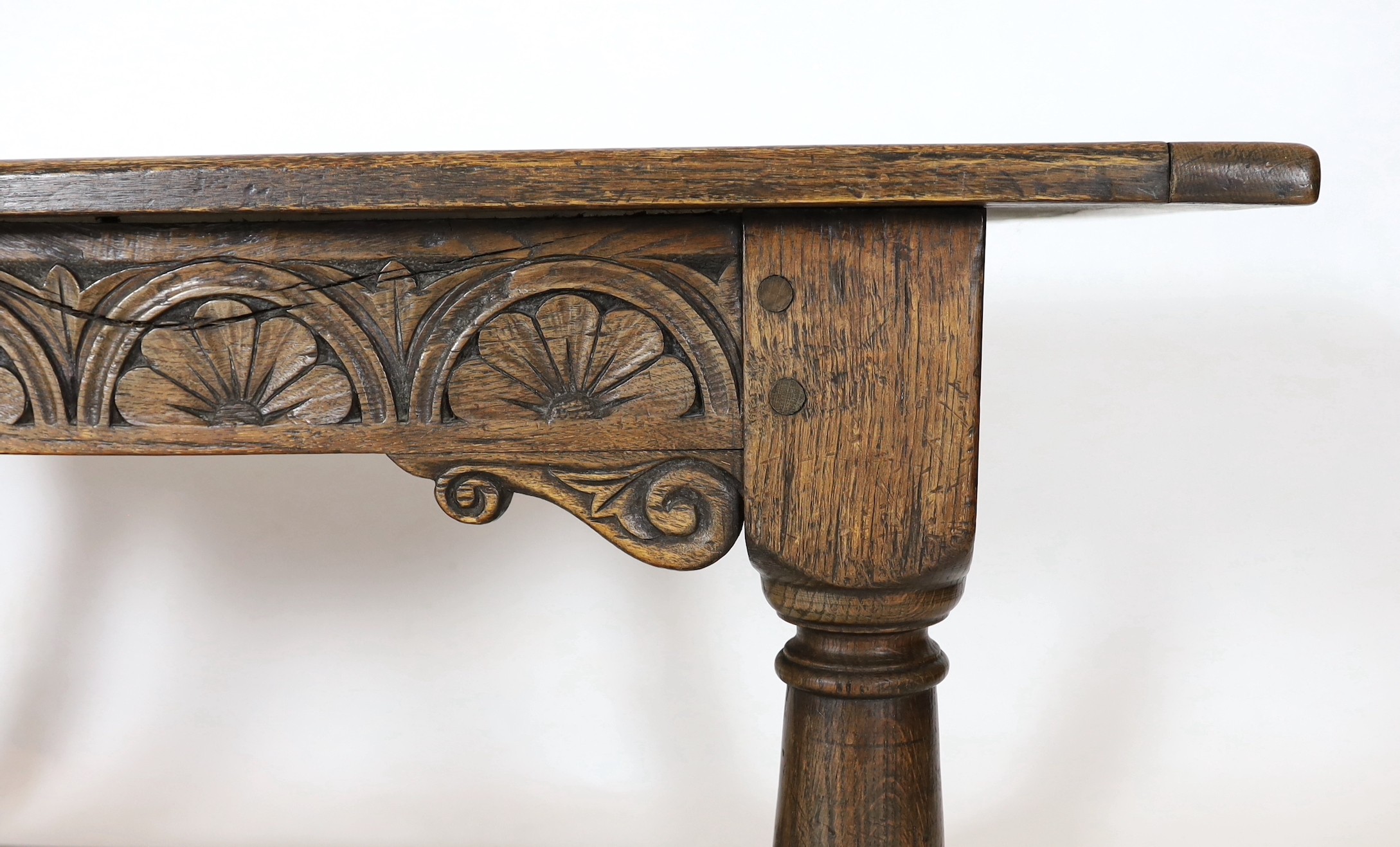 A 17th century style oak refectory table, width 167cm, depth 77cm, height 77cm